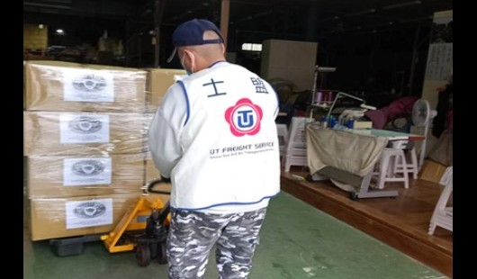 Assisting to deliver relief goods for Japan Earthquake